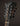 Close-up of a mandolin headstock with 'Northfield' branding on a dark background