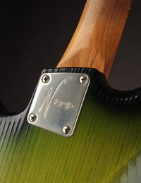 Close up of neck play on a green Novo guitar 