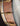 Close up of gold hardware on an open back banjo