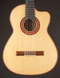 Classical guitar with a dark background