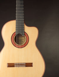 Classical guitar with a dark background