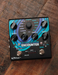Guitar effects pedal with 'Encounter' branding on a wooden surface