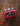 Red effects pedal on wood background