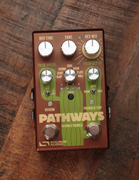 Brown effects pedal on wood background