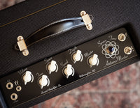 Close up of control panel on an electric guitar amplifier