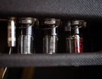 Close up of tubes in a guitar amplifier