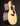 Side view of Taylor acoustic guitar on a dark background