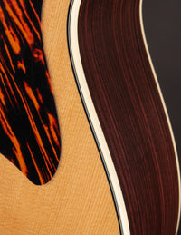 Close up of the binding on a Taylor 712e Gold Label.