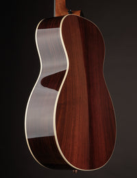 Picture of side and back of a Taylor 712e Gold Label.