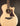 Taylor acoustic guitar on a dark background