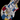 Close-up of an electric guitar with a Piet Mondrian-inspired geometric pattern in blue, red, yellow, black, and white, shown against a solid black background.