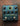 Source Audio One Series Collider Delay & Reverb pedal with various control knobs and footswitches on a wooden surface.