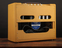 A photo of the rear of the Victoria Vicky Verb amp, highlighting the Victoria branded Eminence made speaker. 
